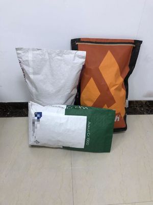 Accepteer aangepaste 25kg knijpbodem papieren zakken met aangepast ontwerp